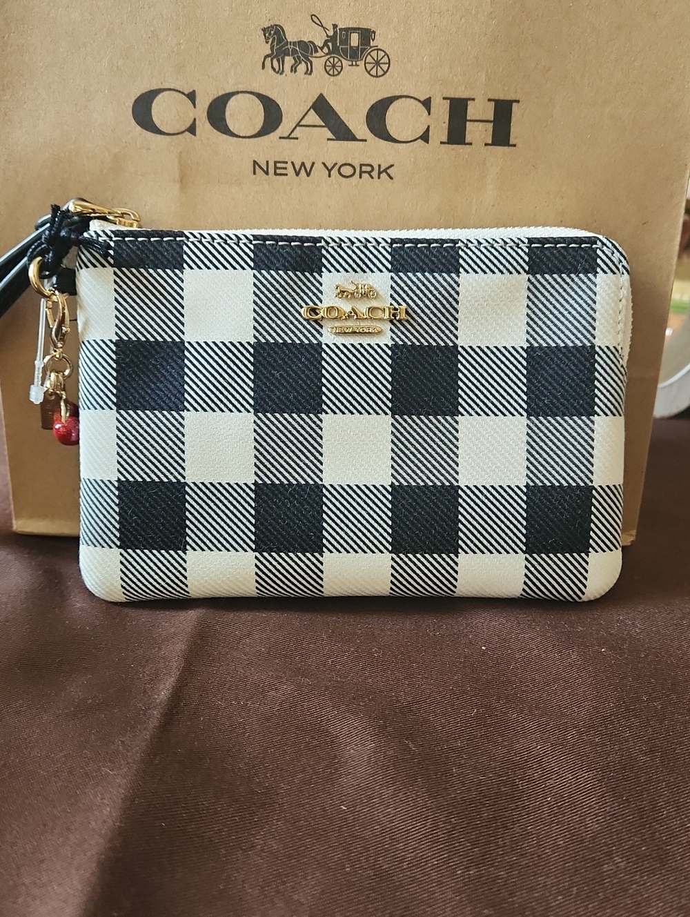 Coach Black and White Buffalo Plaid Wristlet Pouch with Gold Hardware With Charm